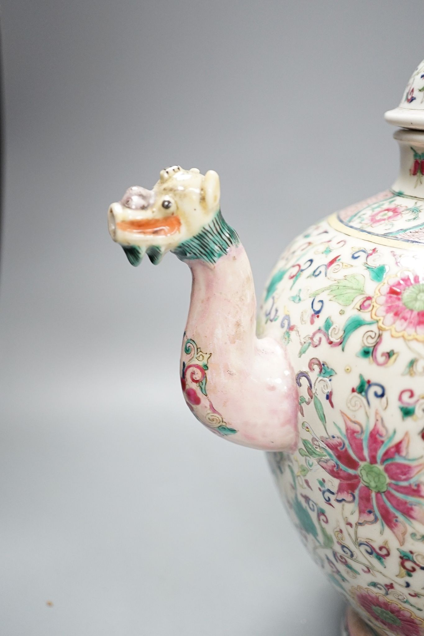 A large 19th century Chinese famille rose wine pot, and another wine pot, tallest 27cm